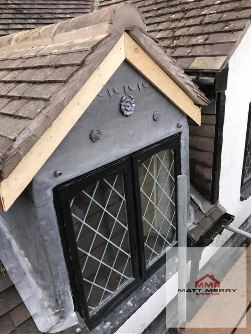 Leadwork dormer with new lead flashing and leaded-glass window installation by Matt Merry Roofing, Hinckley