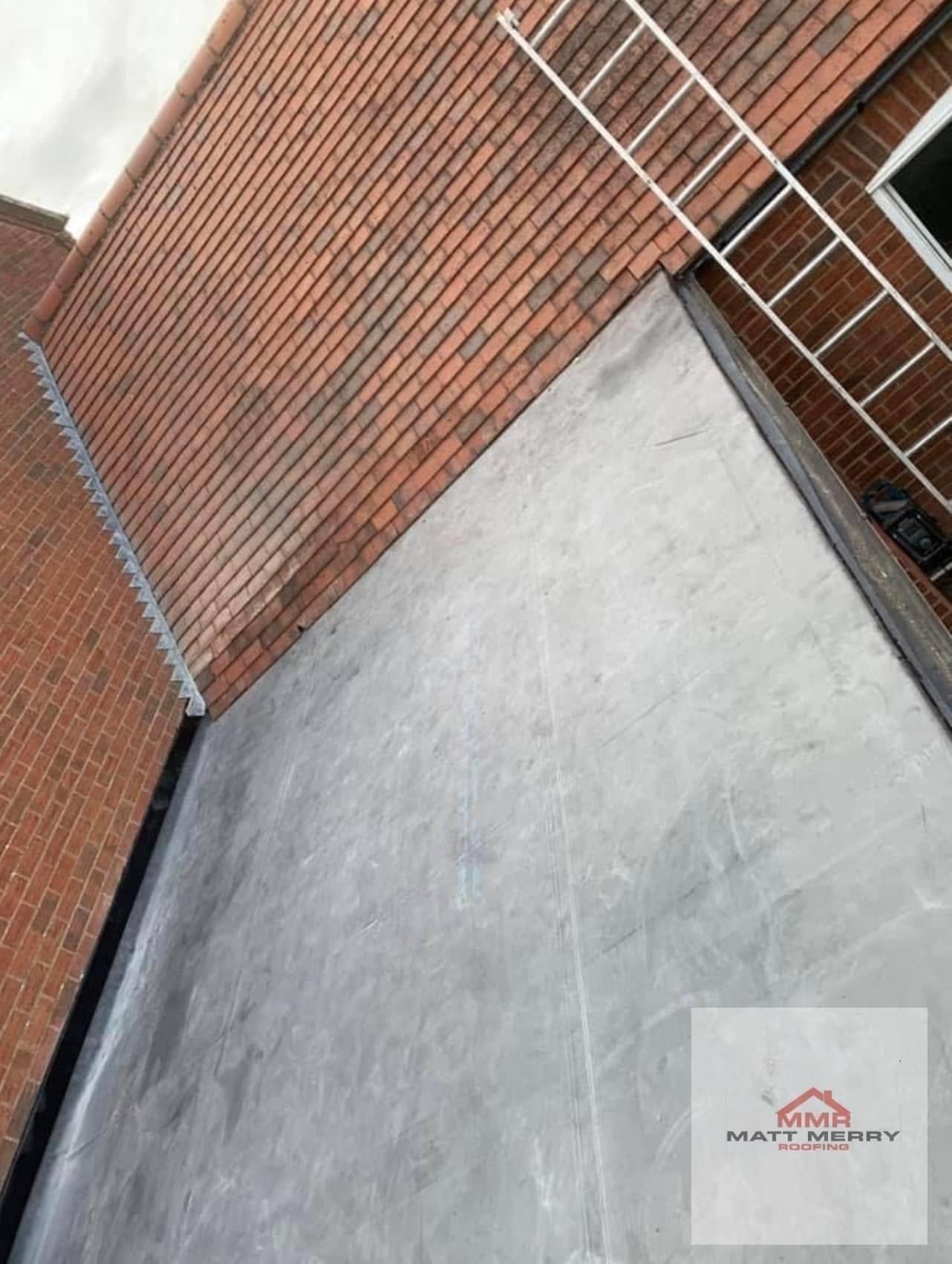 Freshly laid flat roof with clean edge detailing and box gutter completed by Matt Merry Roofing, Leicestershire